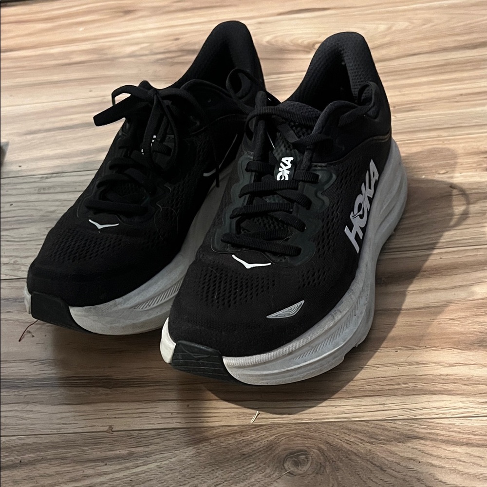 Hoka women’s Black and White Running Shoes